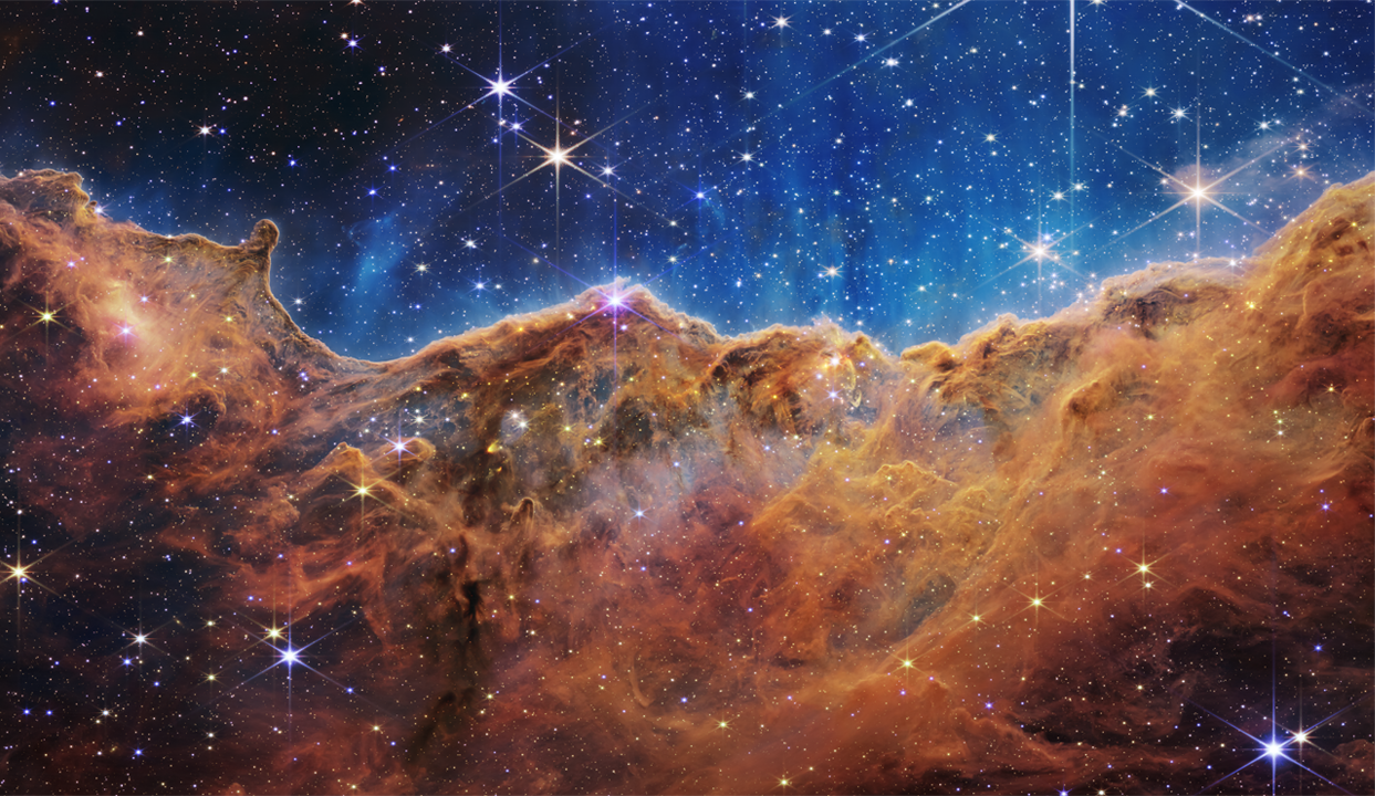 “Cosmic Cliffs” in the Carina Nebula | Credit: NASA, ESA, CSA, STScI